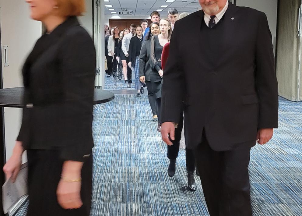 Second faculty initiate in procession